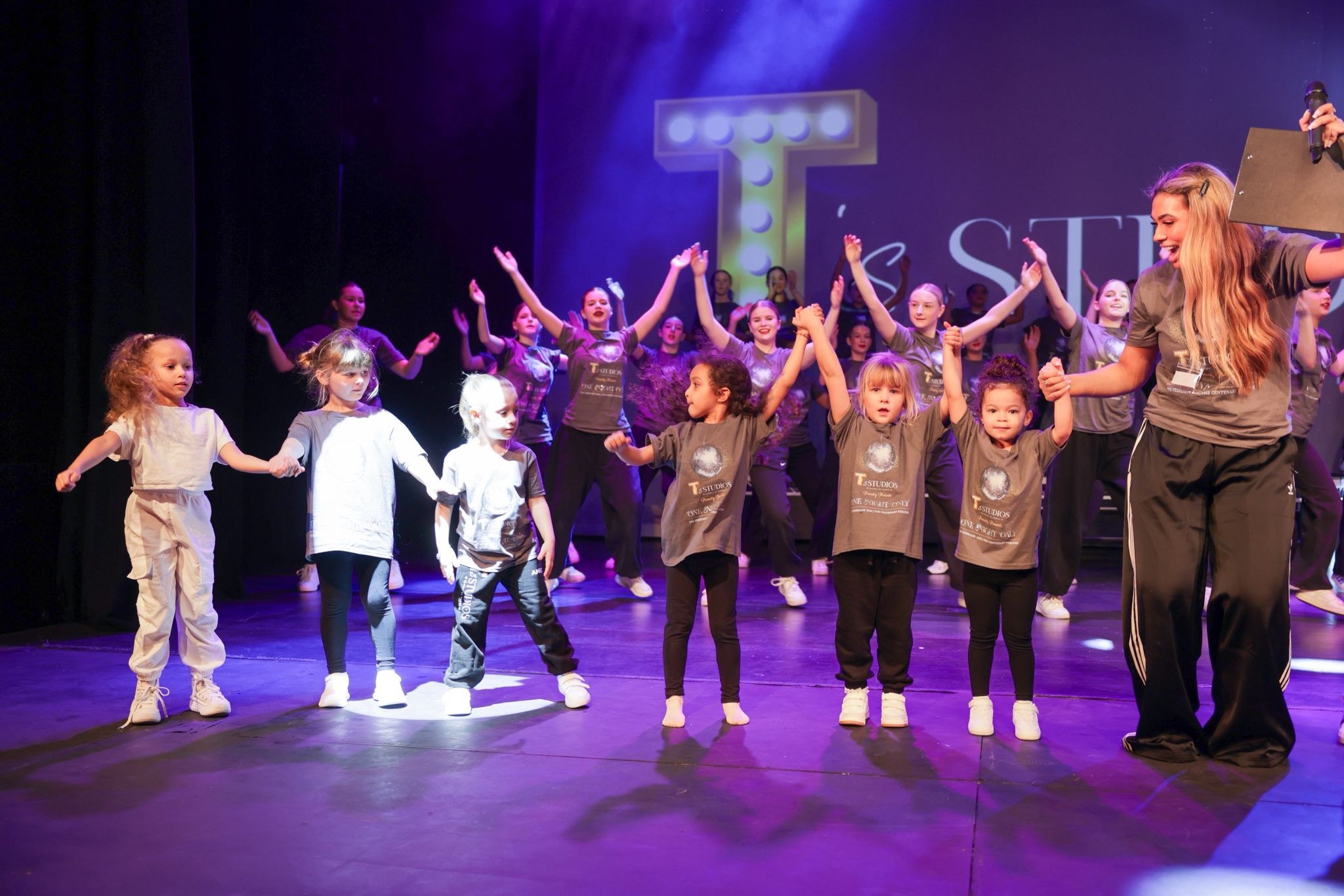 T's Studios dancers performing on stage